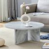 A Multi-style Decor Friendly MDF White Round Coffee Table, Featuring Modern Minimalism and Nordic Flair, with Dimensions of 31.5*31.5*13.98 Inches.
