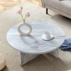 A Multi-style Decor Friendly MDF White Round Coffee Table, Featuring Modern Minimalism and Nordic Flair, with Dimensions of 31.5*31.5*13.98 Inches.